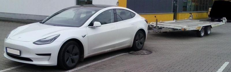 Tesla_mit_Trailer_800.jpg.46a6cdd4041993dc51ec4bfd21c018d9.jpg